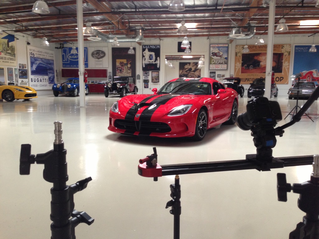 Production setup in the garage for filming a Dodge Viper.